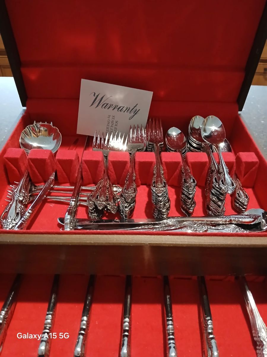 Over 80 piece Oneida utensils with box