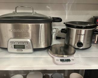 Lots of Cuisinart crock pots, food processors, mixers etc.. 