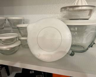 Pampered chef glass bowls and measuring cups with lids