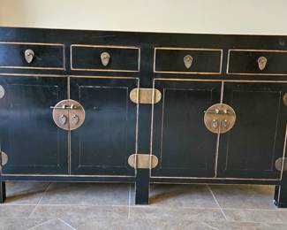 Asian credenza with brass accents