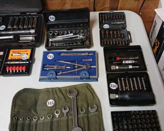 All those little tool boxes are Craftsman. Vietnam era pocket wrench set.