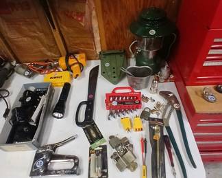 That knife in the middle is a Vietnam era machete, stamped US.