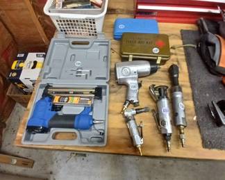 A few pneumatic tools. Vietnam era first aid kit.