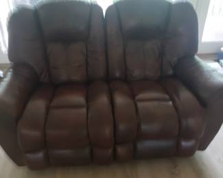 Nice leather reclining loveseat 