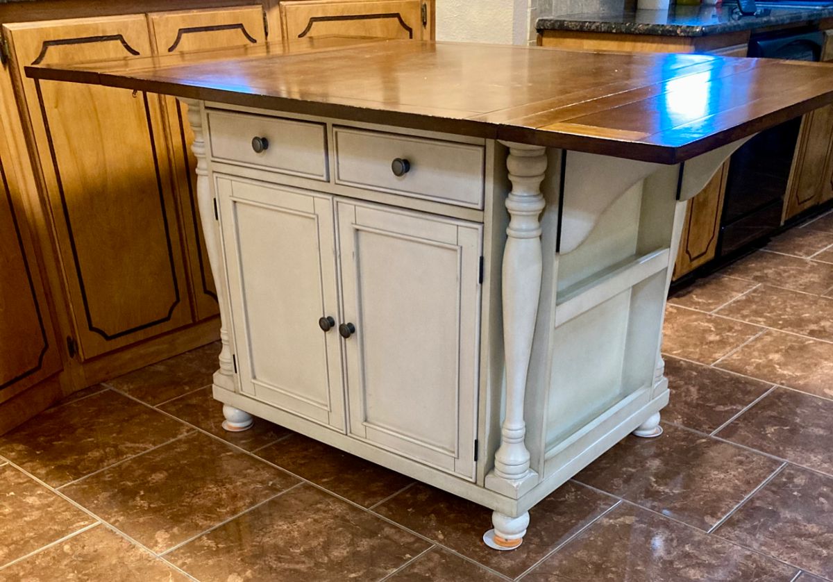 2-Drawer Drop Leaf Kitchen Island Table. W 42" x L42" x H 36". Expands Fully to 66".