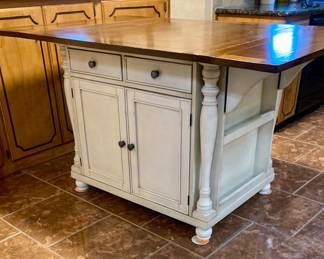 2-Drawer Drop Leaf Kitchen Island Table. W 42" x L42" x H 36". Expands Fully to 66".
