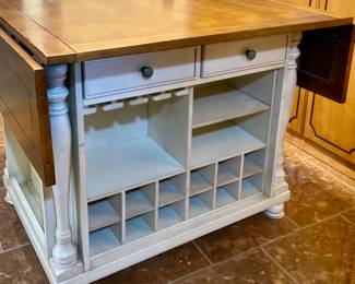 2-Drawer Drop Leaf Kitchen Island Table. W 42" x L42" x H 36". Expands Fully to 66".