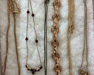 Hundreds of pieces of jewelry, including many signed pieces and sterling silver.