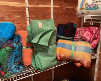 Wool blankets, bedding and luggage