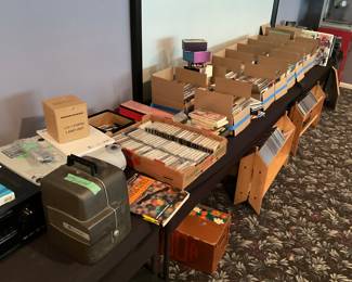Hundreds of CD’s in great shape. Antique and newer projector systems. Cassette Tapes