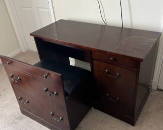 Desk with pull out chair and storage
*water damage on surface*
$50