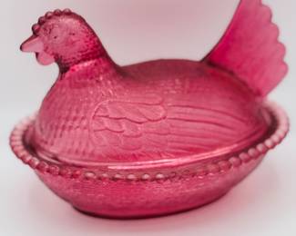 Vintage cranberry glass hen on nest
