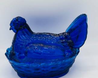 Cobalt blue hen on nest