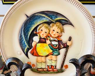 Hummel anniversary plate, umbrella, boy, and girl
