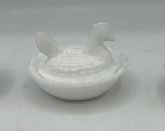 Miniature hens on nests