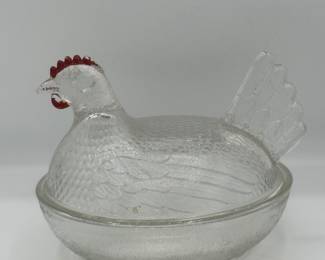 Clear glass hen on nest