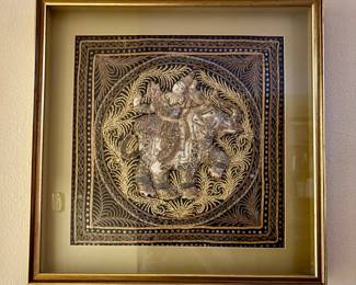 Burmese Kalaga tapestry featuring an individual riding and elephant. This is a traditional tapestry with beads and sequins in a framed shadowbox (24" x 24"): $180.00 ea