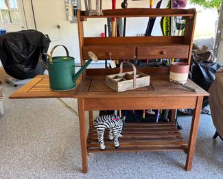 Potting Bench. 3 tier, 2 shelf, 2 drawer (32"h x 62"w x 24"d): $120.00
