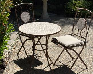 Metal lattice seat patio chairs with cushions and matching tile work table top matching the chair backs: $160.00
