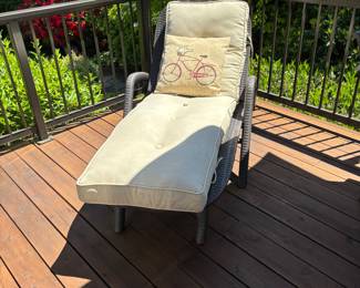 Outdoor 'Faux' rattan chase lounge w/cushion: $150.00