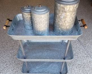 3 - tier Potterybarn galvanized metal rolling cart (30" h x 28" w x 14"d): $60.00 Galvanized lidded tins: $12.00 ea.