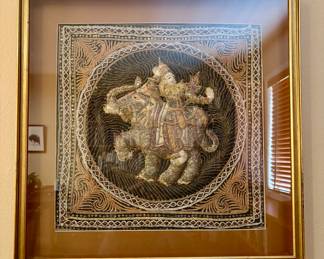 Burmese Kalaga tapestry featuring an individual riding an elephant. A traditional hand embroidered tapestry with beads and sequins in a shadow box (24 x 24): $180.00 ea. (2 available)