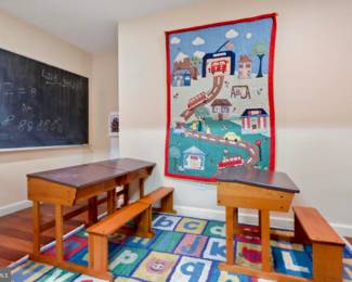 Three vintage school desks with bench seats