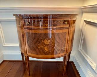 PAIR of lacquered demilune cabinets with inlay