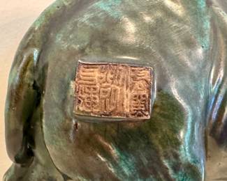 Stamp on back of elephant