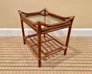 Rattan side table with glass top