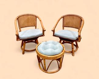 Vintage pair of Ficks Reed rattan swivel armchairs with rattan ottoman