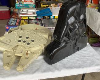 By Kenner, the Stars wars Millenium Falcon 1979 and the Darth Vader case and toys 1980’s