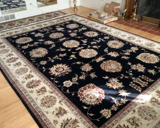 Beautiful black centered rug with cream border…..presale $300