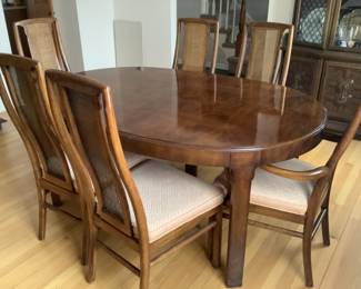 Dining room table with six chairs and leaves plus pads.  Presale available at $275