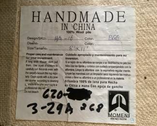 Ticket on back of next rug picture