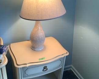 Lammerets white nightstand with gold accents..presale available for $55.  