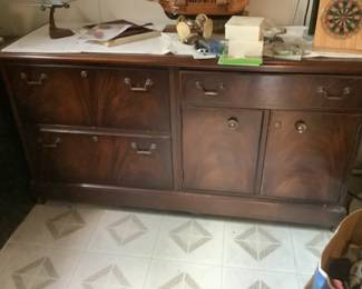 Credenza…..2 drawers on right can be files, top right drawer opens down and storage in cabinet.   Presale $85