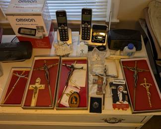 Alarm Clocks - Blood Pressure reader - Cordless Phones - Crosses - Holy Water