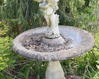 concrete large birdbath with cherub