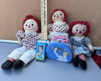 4 Raggedy Ann Dolls and Lunch Box $32.00