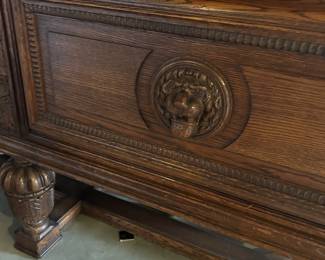 Vintage Lion adorned wood sideboard with locking doors