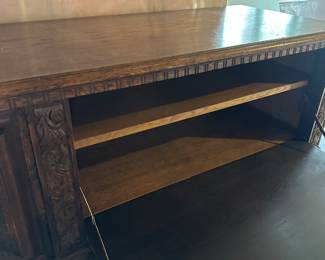 Vintage Lion adorned wood sideboard with locking doors