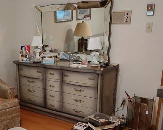 This 4 piece matching bedroom set looks like it just came off the showroom floor! Beautiful beveled mirror
