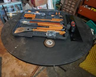 round table, grill tools