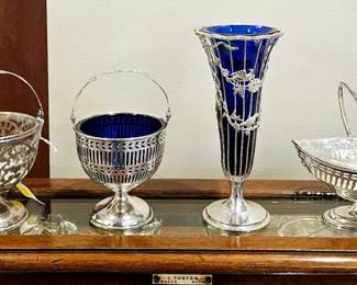 Victorian silver sweet gray baskets and vases. Unreal