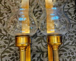 Beautiful brass wall candle holders with glass hurricanes