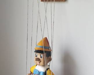Carved wood Pinocchio puppet