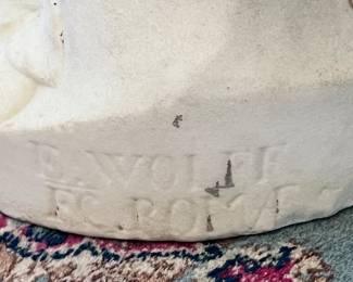 E. Wolff on back of statue