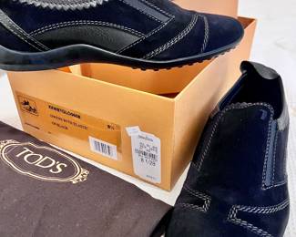 HUGE AMOUNT OF WOMENS CLOTHING AND SHOES! HIGH END BRANDS AND ALL THE CLOTHING WAS STILL HANGING WITH THE DRY CLEANER BAGS ON THEM! PRESTIGE CONDITION. THESE ARE TODS SHOES SIZE 8.5. MOST CLOTHING IS LARGE AND XLARGEL SOME MEDIUMS