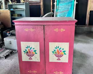 Vintage red cabinet with original stenciling